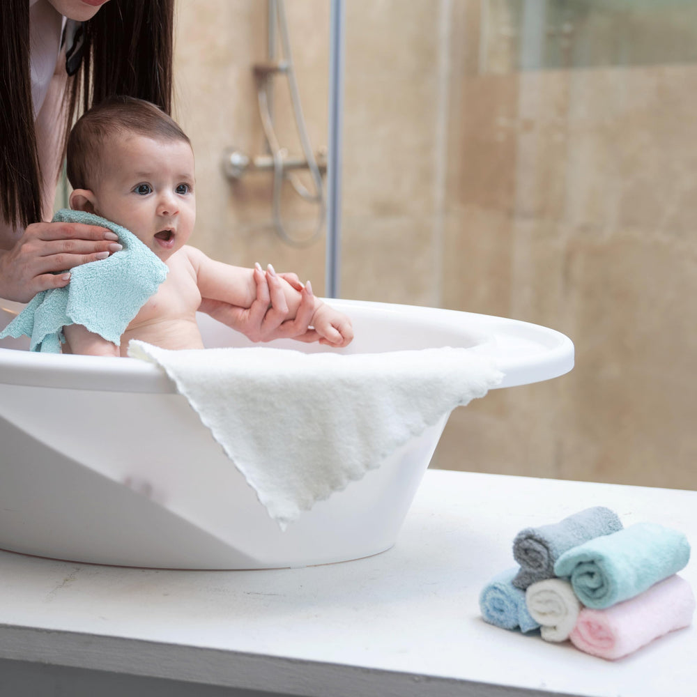 Slick Baby Washcloths showcase 10x10 size and coverage.