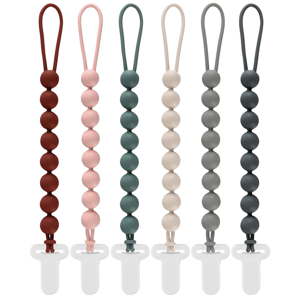 Slotic pacifier clip pack of six keeps pacifiers within reach on the go.