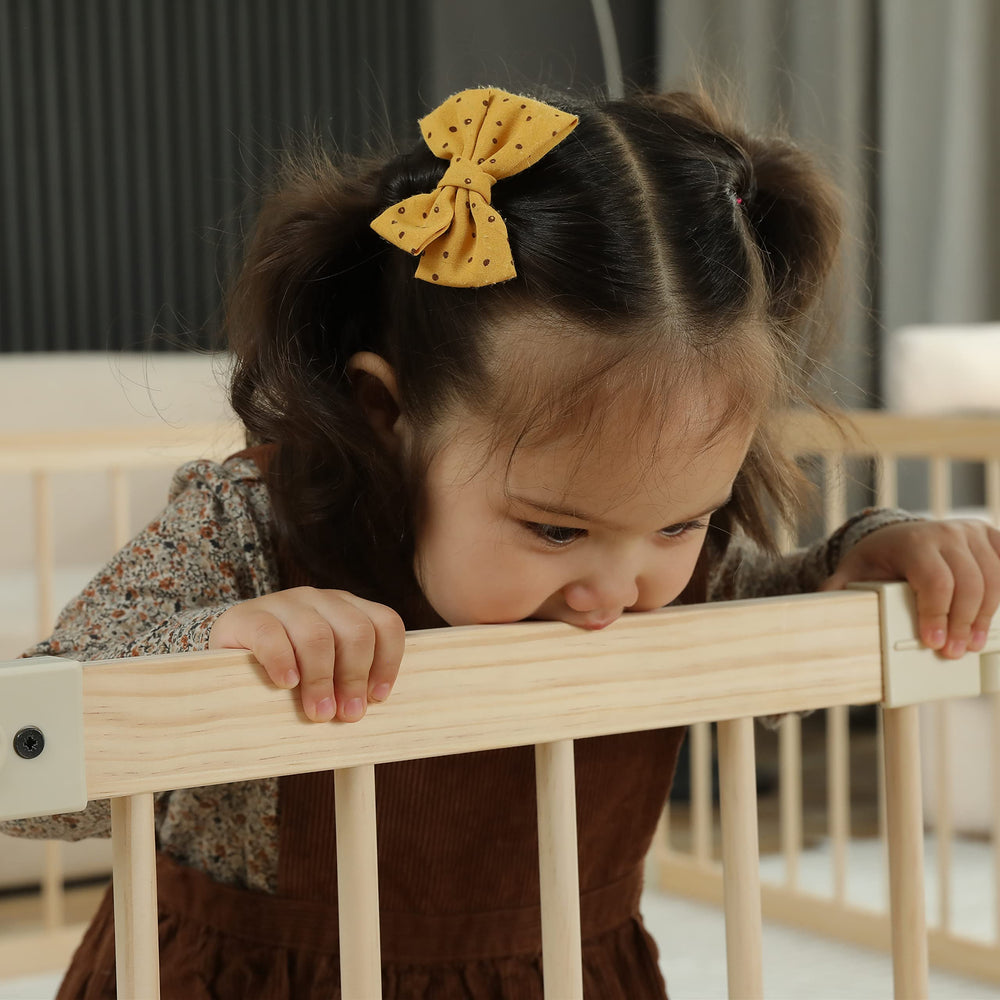 Smilebaby playpen slat spacing enables easy visibility of baby