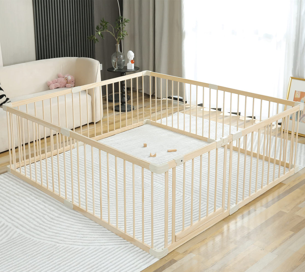 Smilebaby Conababy wooden playpen assembly shows sturdy construction for durable play sessions