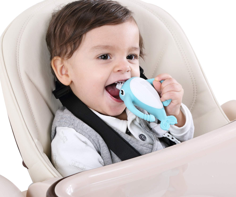 Smily Mia Narwhal teether with textured tusk as a gentle toothbrush.