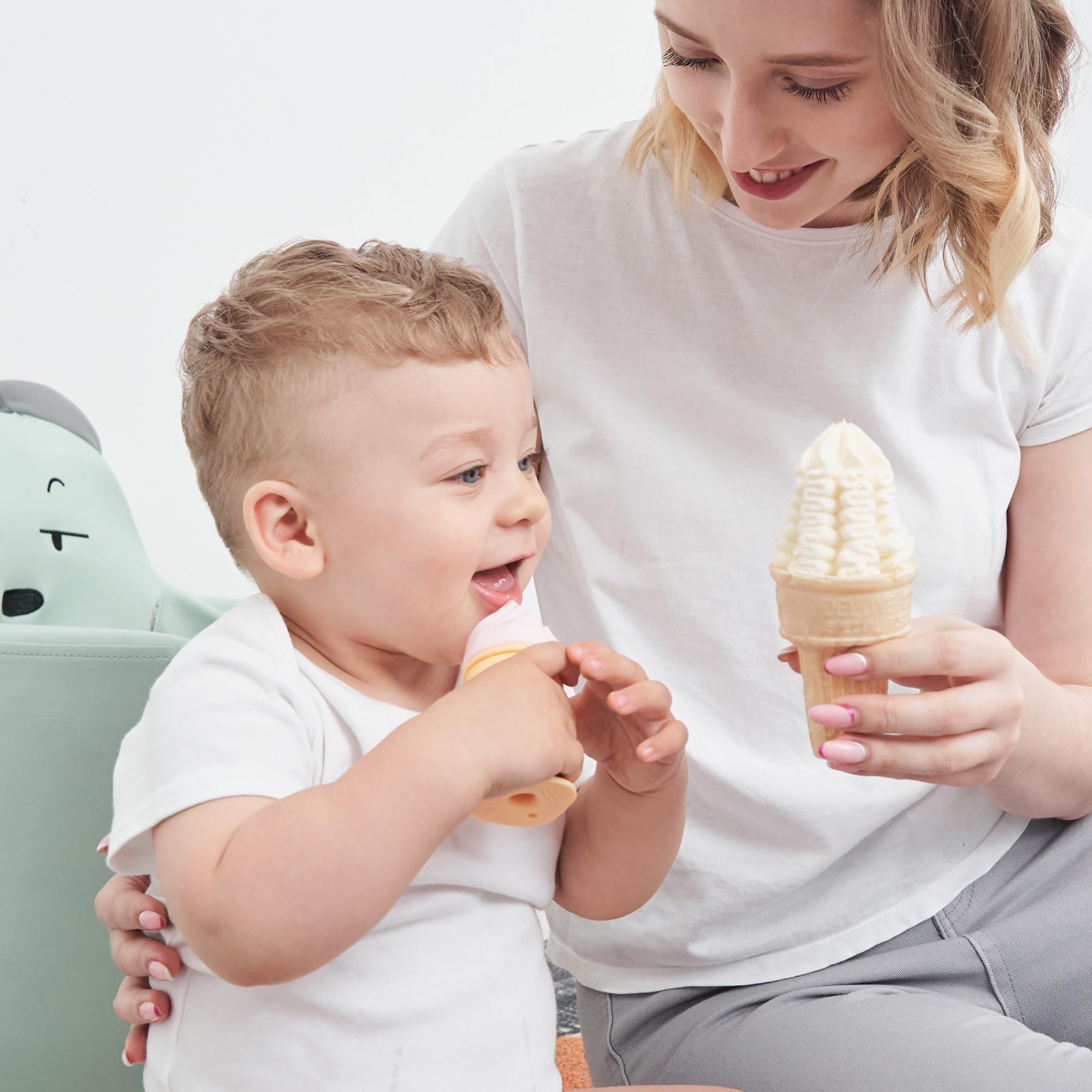 Smily Mia peach-pink teether appeals to babies and parents