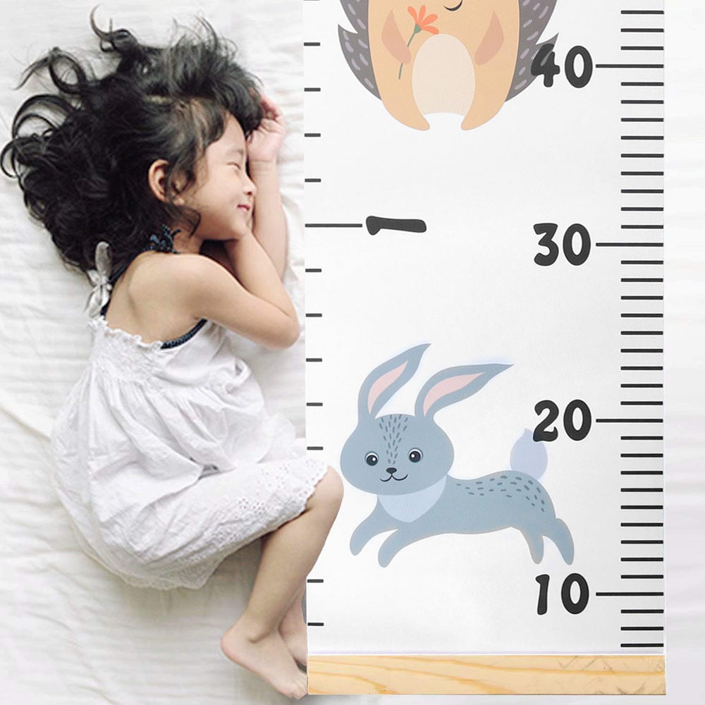 Smlper height ruler complements baby rooms with non-toxic materials and a clean, tasteful aesthetic.