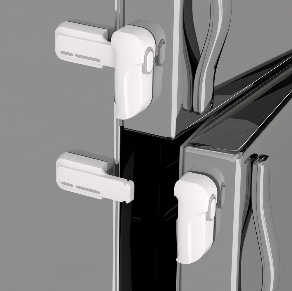 Snowharp child proof freezer latch with front and rear buttons for one-handed use.