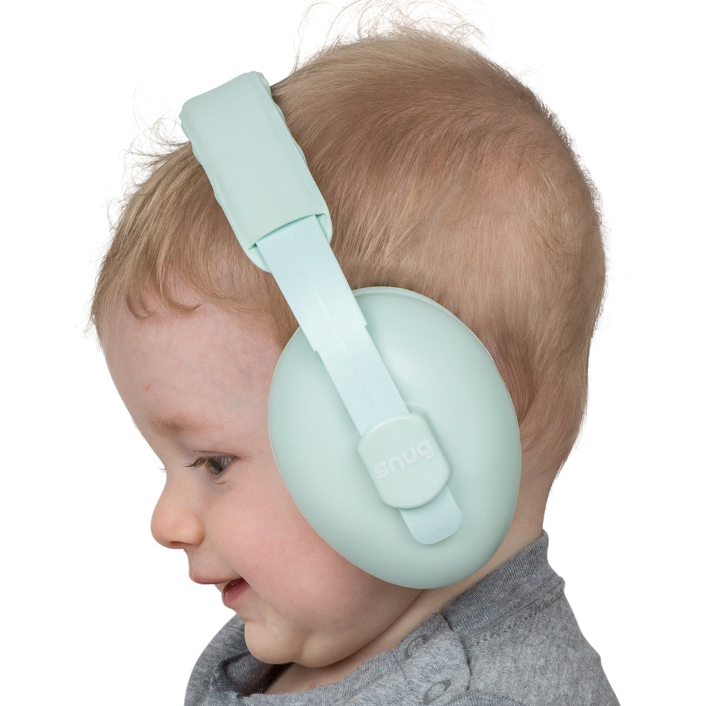 Snug Baby Earmuffs in use at a concert reduce noise exposure for little listeners.