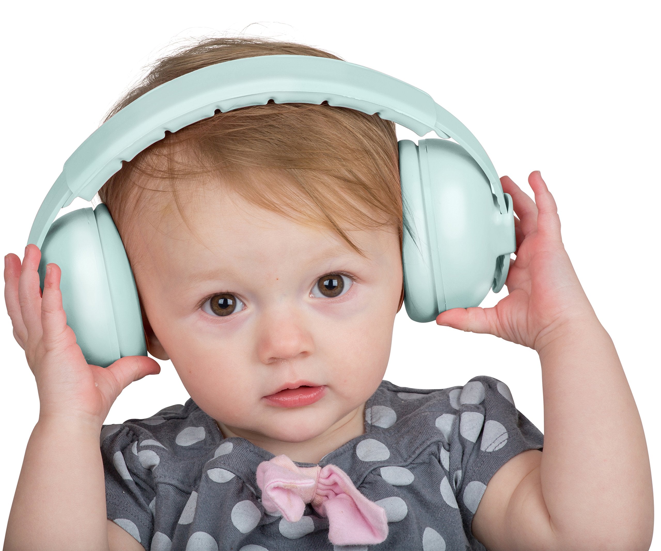 Snug Baby Earmuffs on a baby during flight minimize cabin noise.