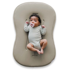 Snuggle Me Lounger Curve cover closeup, buttery-soft organic cotton for gentle newborn comfort.