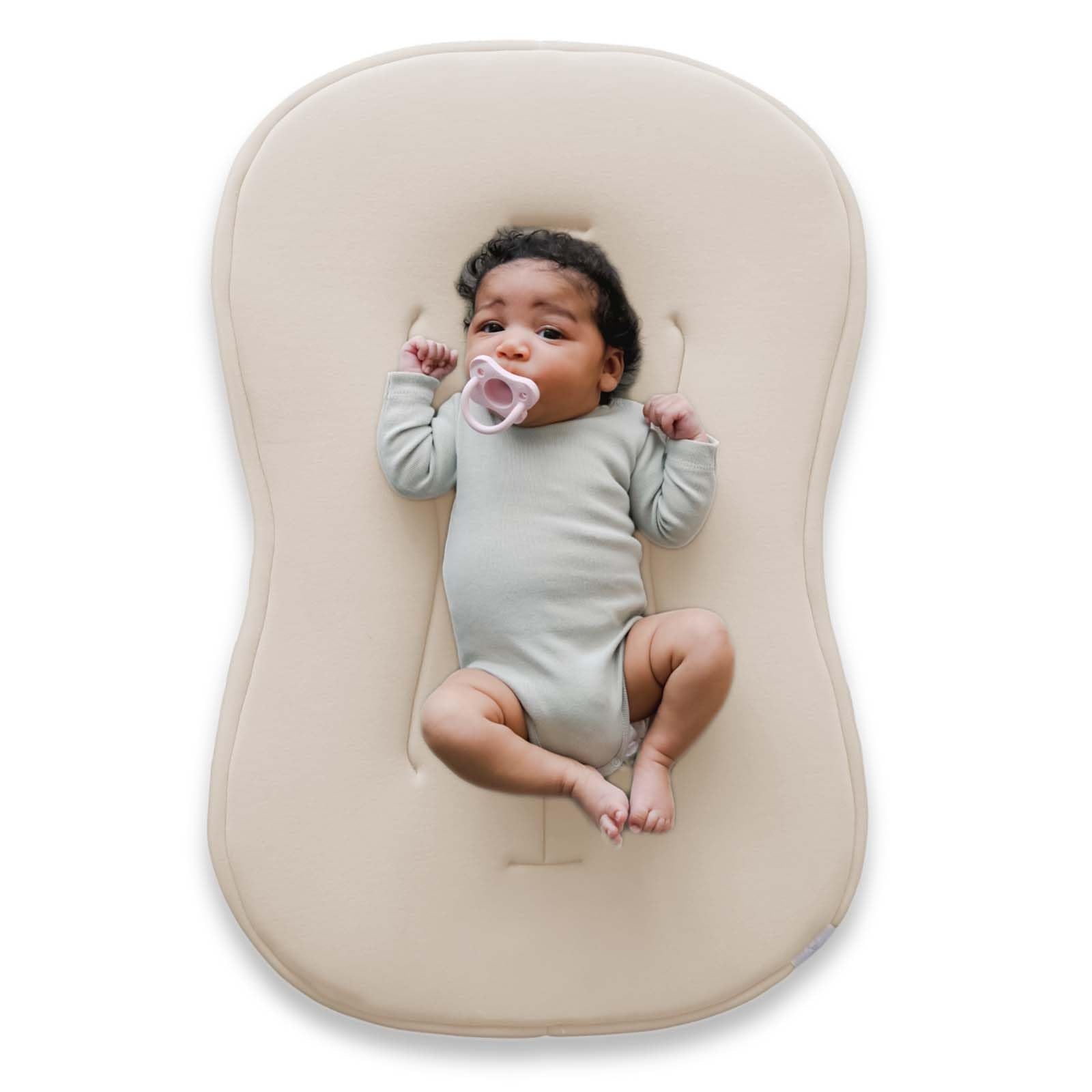 Snuggle Me Baby Lounger Curve cover detail in buttery-soft organic cotton for gentle newborn touch.