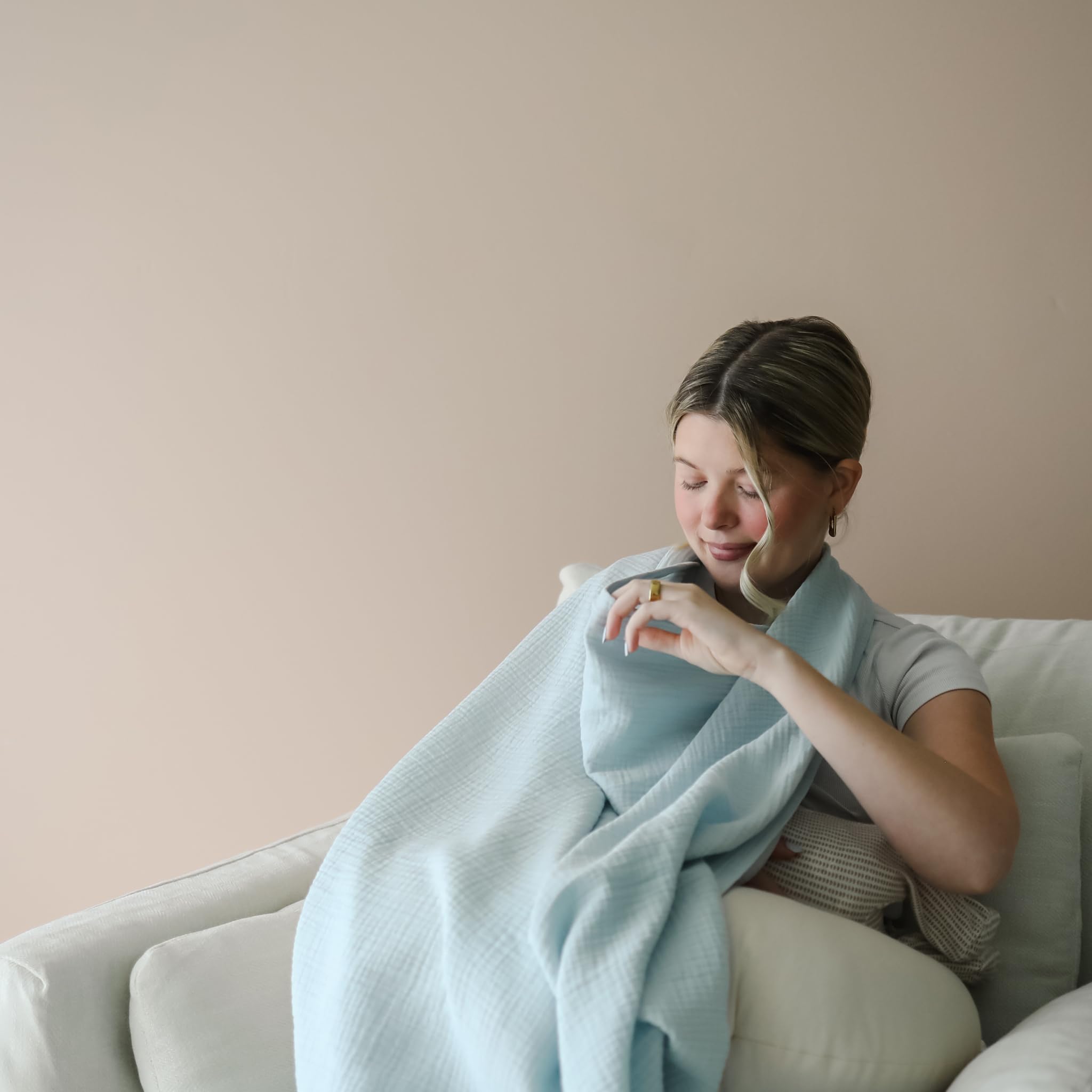 Nursing Cover doubles as a burp cloth with gentle absorption from snuggle me