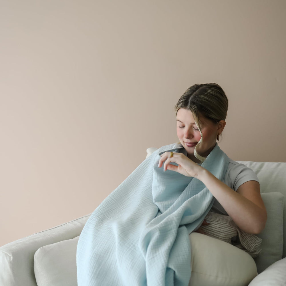 Nursing Cover doubles as a burp cloth with gentle absorption from snuggle me
