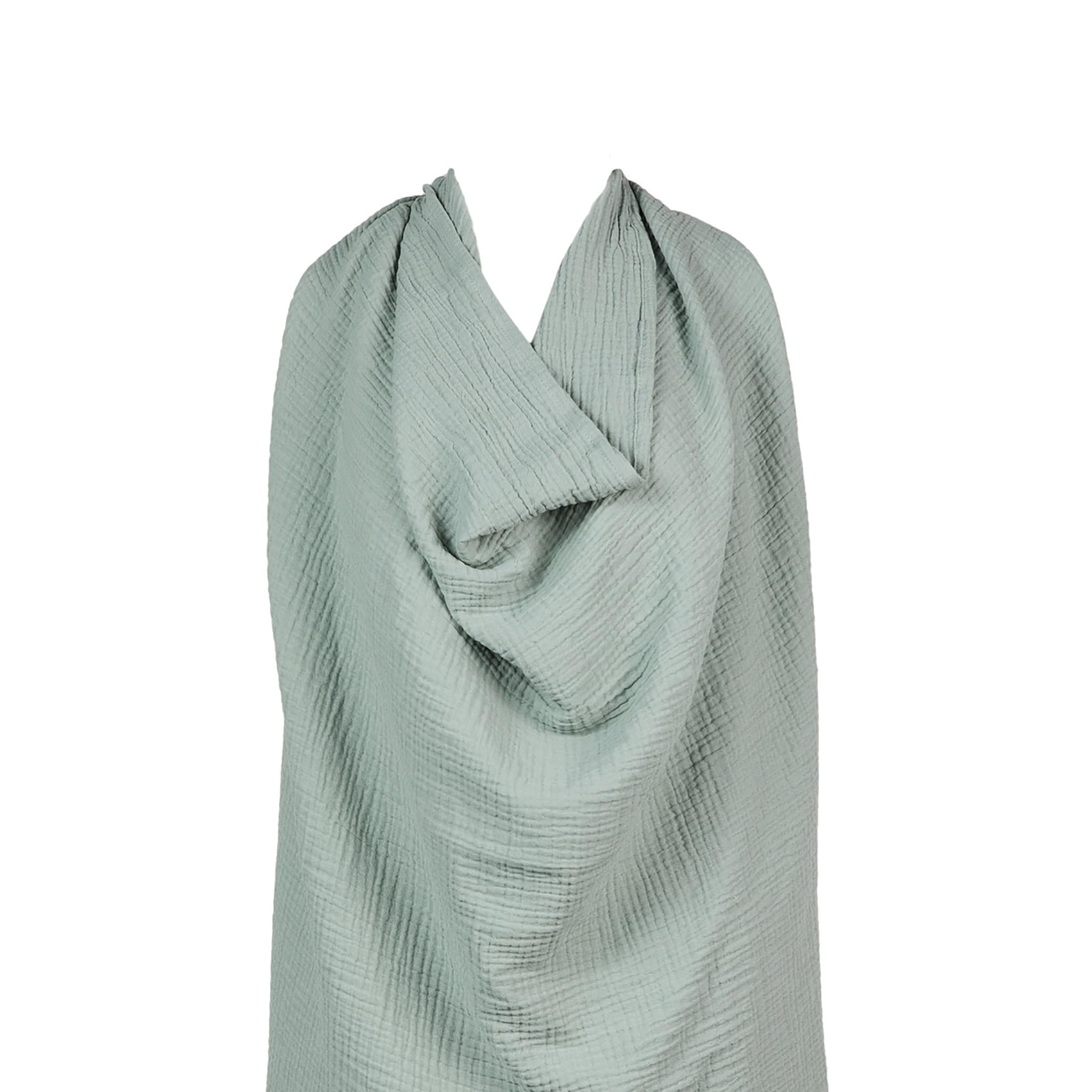 snuggle me nursing cover in organic cotton muslin offers soft, breathable privacy.