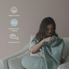 snuggle me nursing cover featuring BPA-free silicone teether ring for little hands.