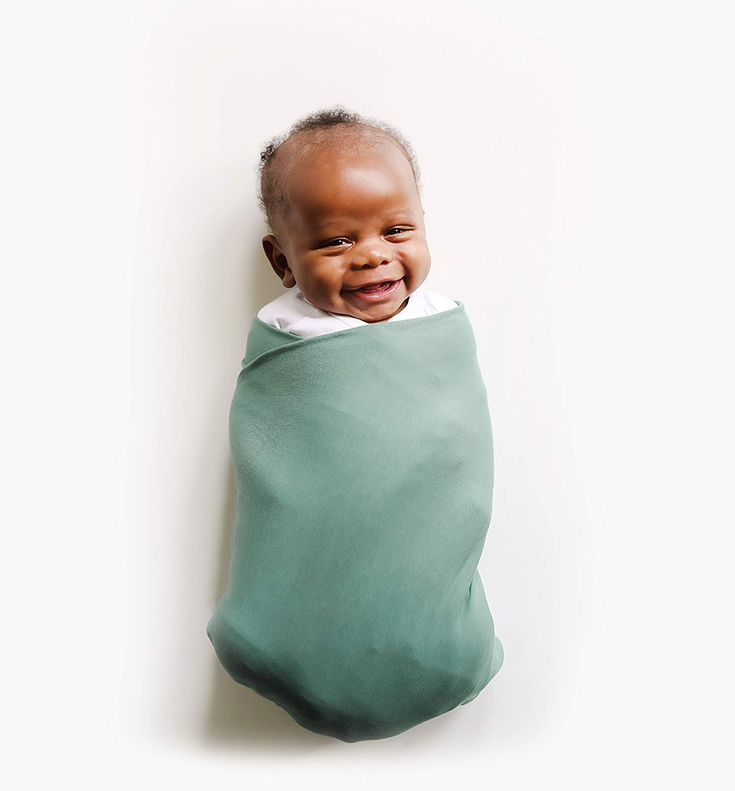 Snuggle Me Swaddle organic cotton close-up highlighting silky stretch for comfy swaddling.