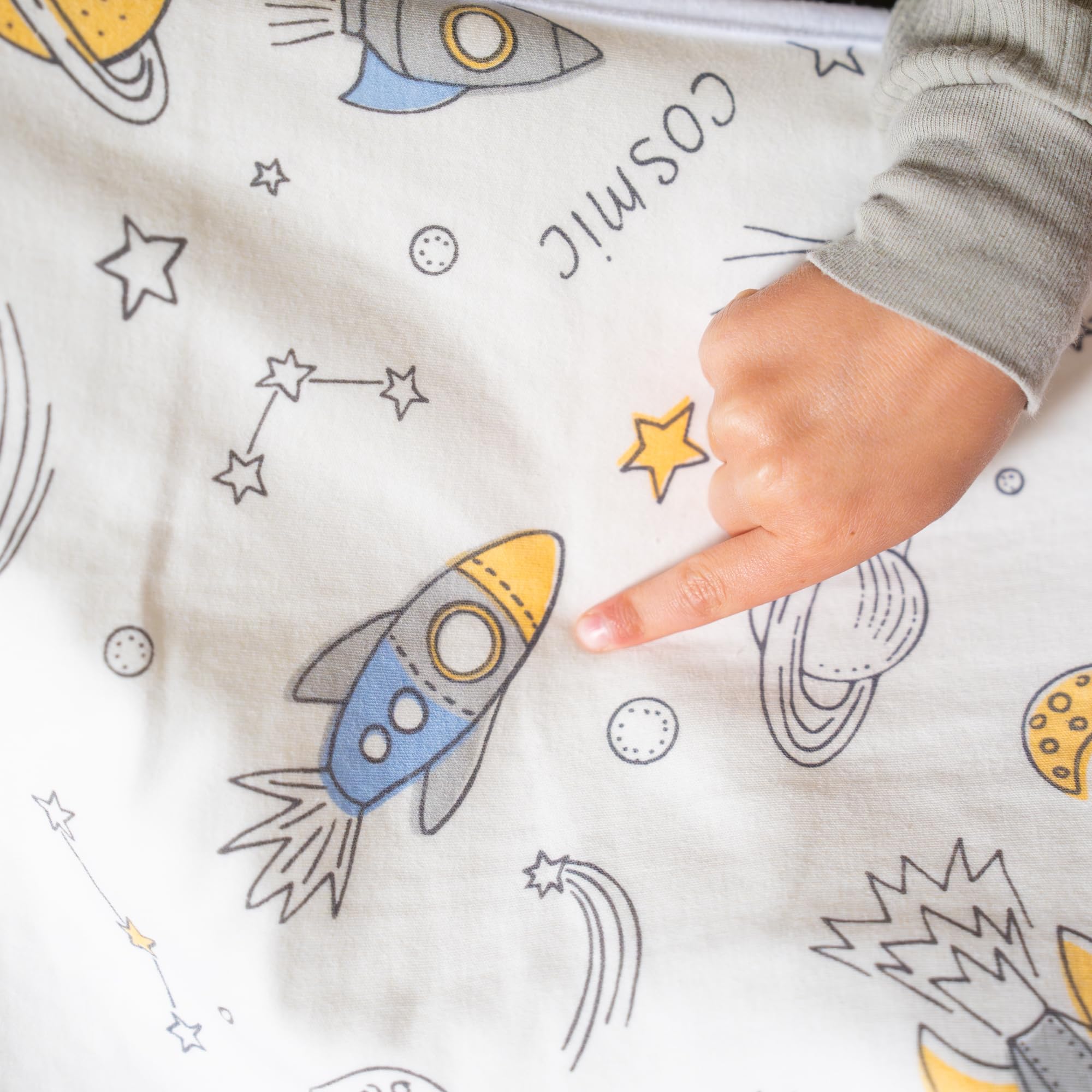 Snugglekid airplane print page adds fun while protecting bedding.