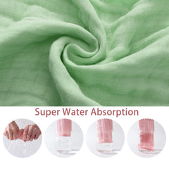 SnugOre burp cloths demonstrate absorbency action catching dribbles and spit-ups.