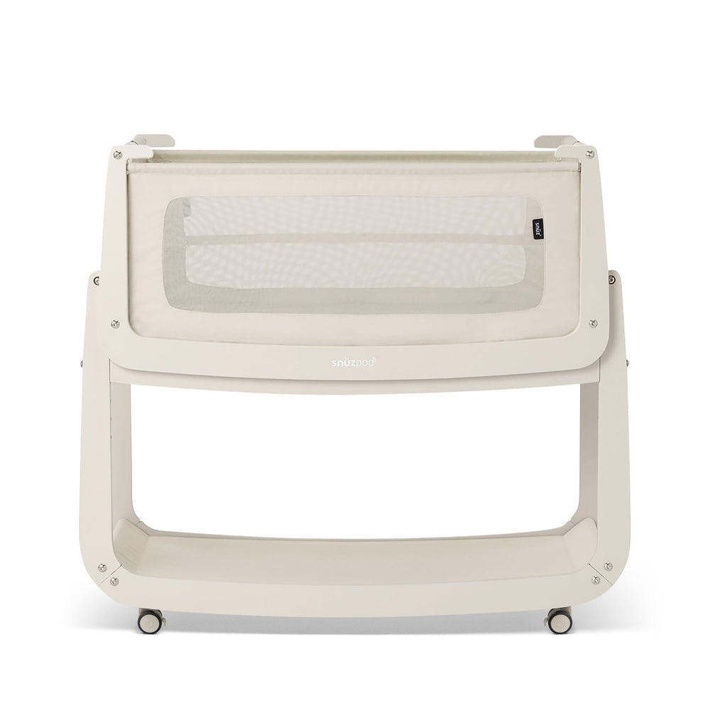 SnuzPod 5 bedside bassinet shown beside a bed for convenient nighttime proximity.