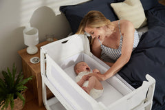 SnuzPod4 lift-off crib showing portable bedside setup for flexible use