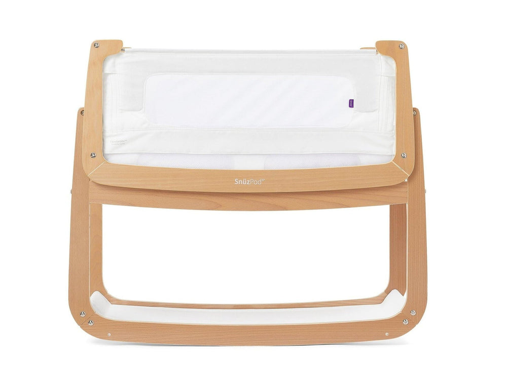 SnuzPod 4 rocking bassinet in natural finish with close night care