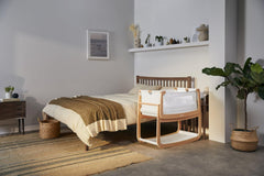 SnuzPod 4 zip-down wall design enabling quick access during night feeds