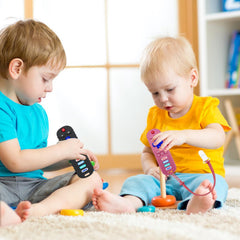 SOLIFEGOBLE pink remote teether, front view highlighting colorful buttons for curious babies.