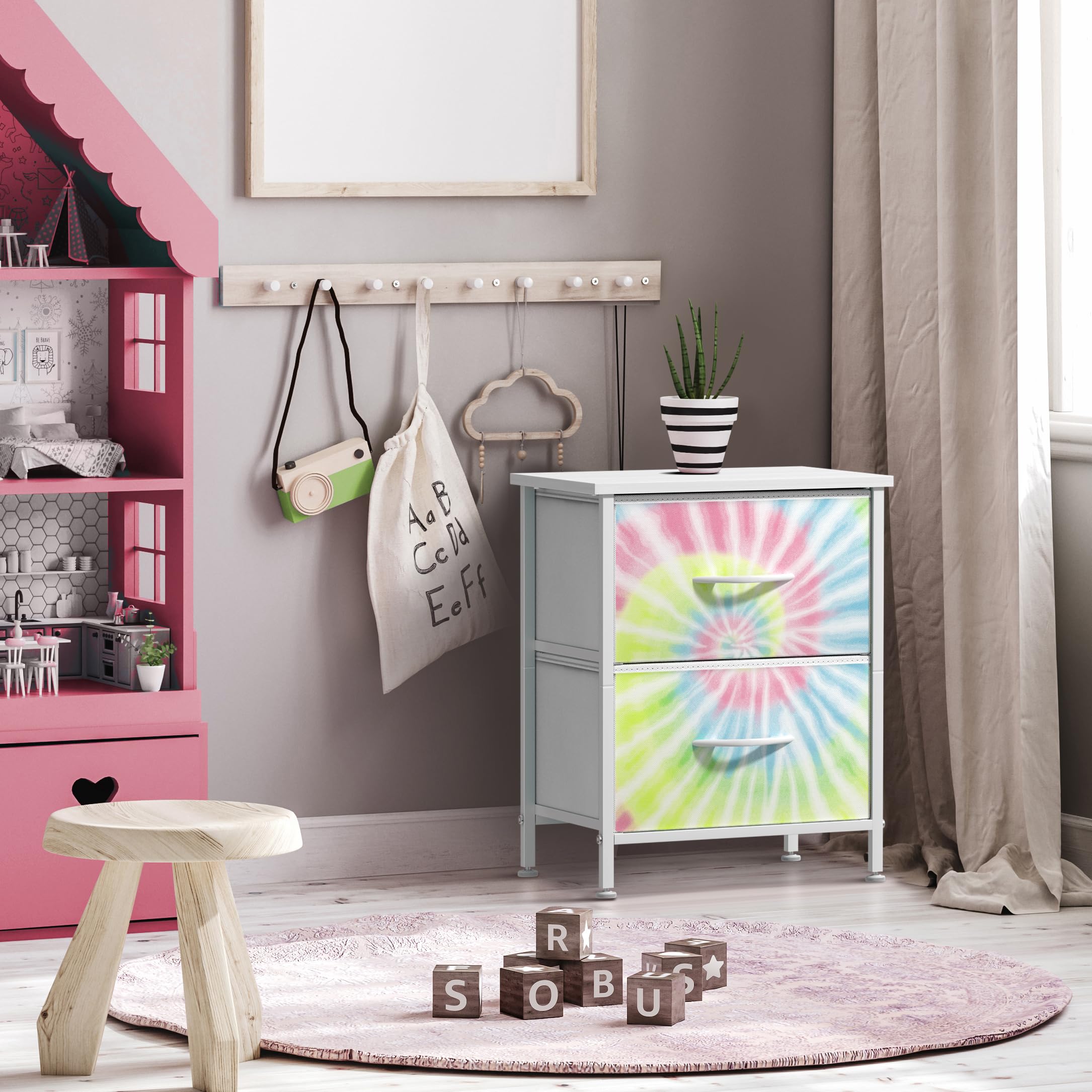 Drawers open smoothly, revealing organized storage for pajamas and notebooks.