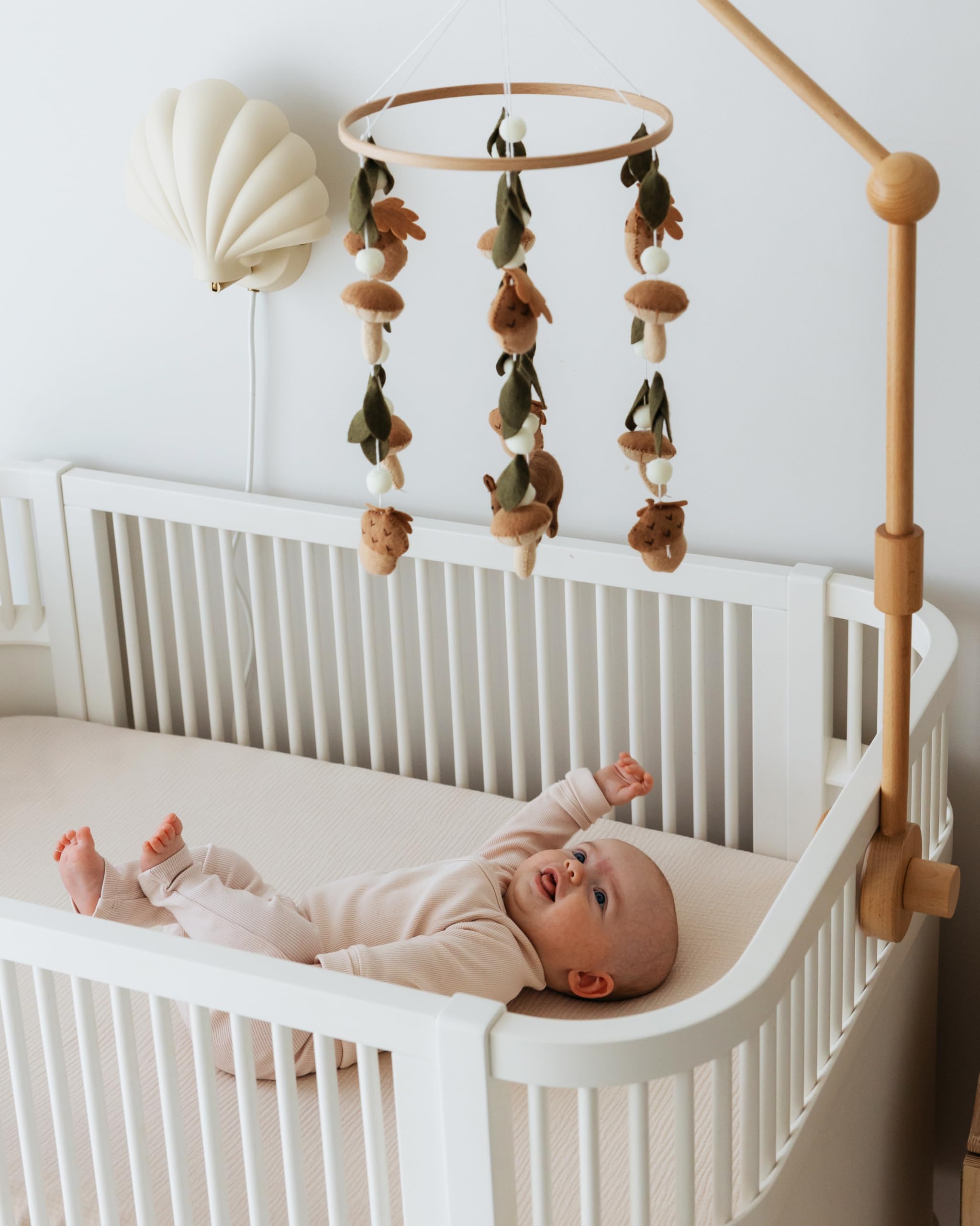 Sorrel and Fern acorns and mushrooms mobile adds whimsy to a nursery