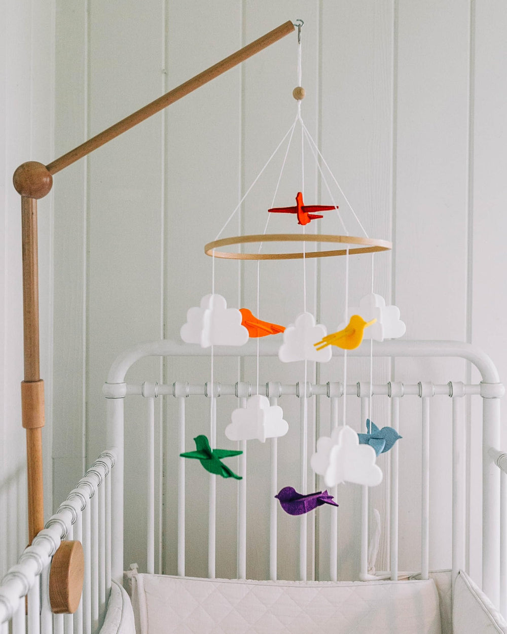 Sorrel + Fern felt birds provide gentle visual interest to help settle baby