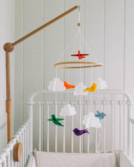 Sorrel + Fern felt birds provide gentle visual interest to help settle baby