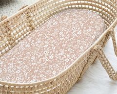 Sorrel and Fern bassinet sheets with deep pockets and fitted elastic prevent sliding.