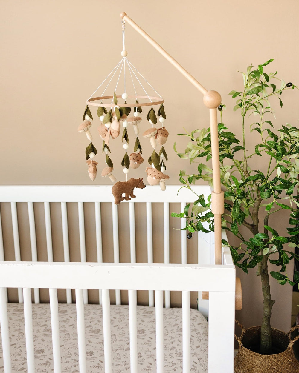 Sorrel and Fern Bear forest mobile brightens a cozy nursery space