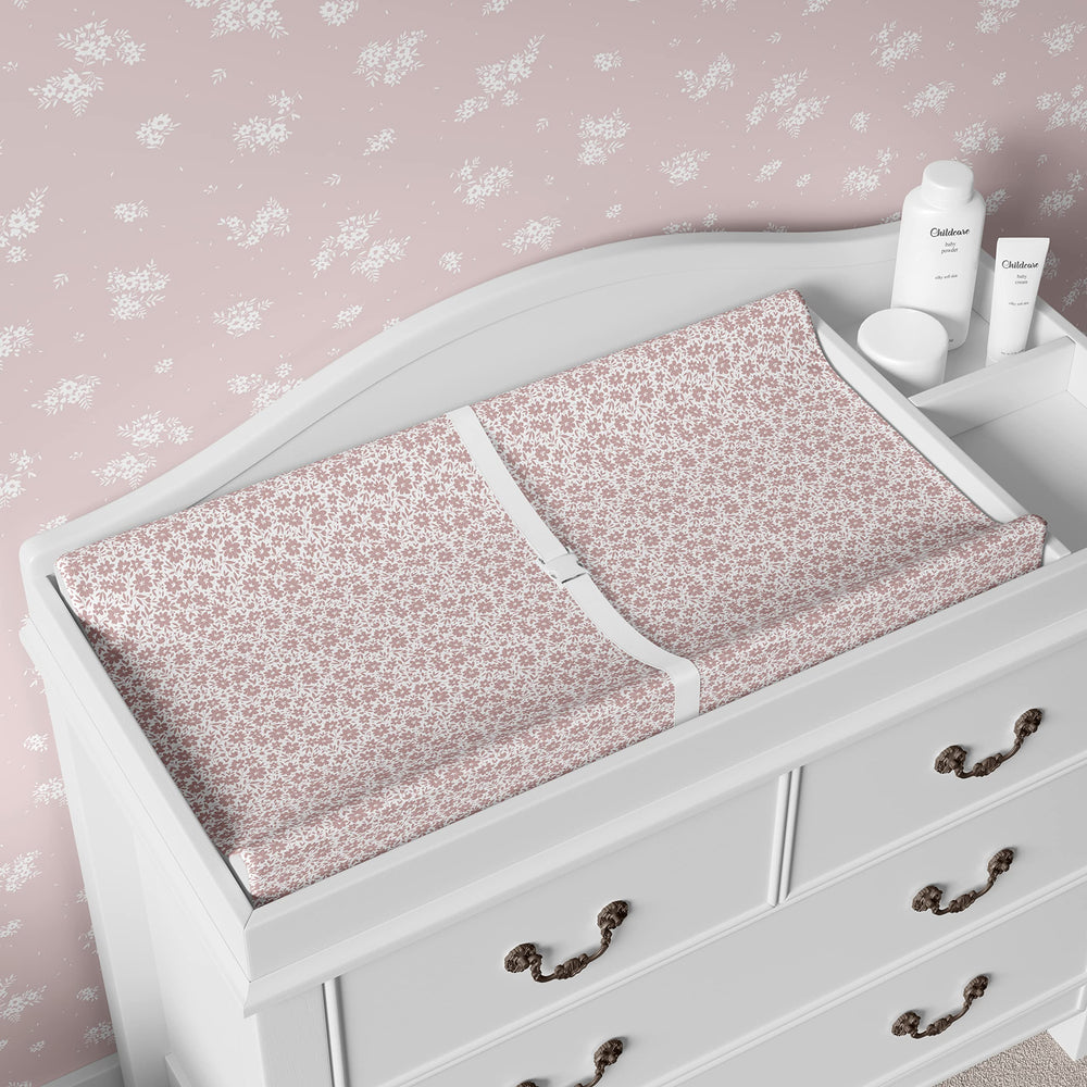 Sorrel + Fern changing pad cover on changing pad demonstrating deep pockets prevent slipping