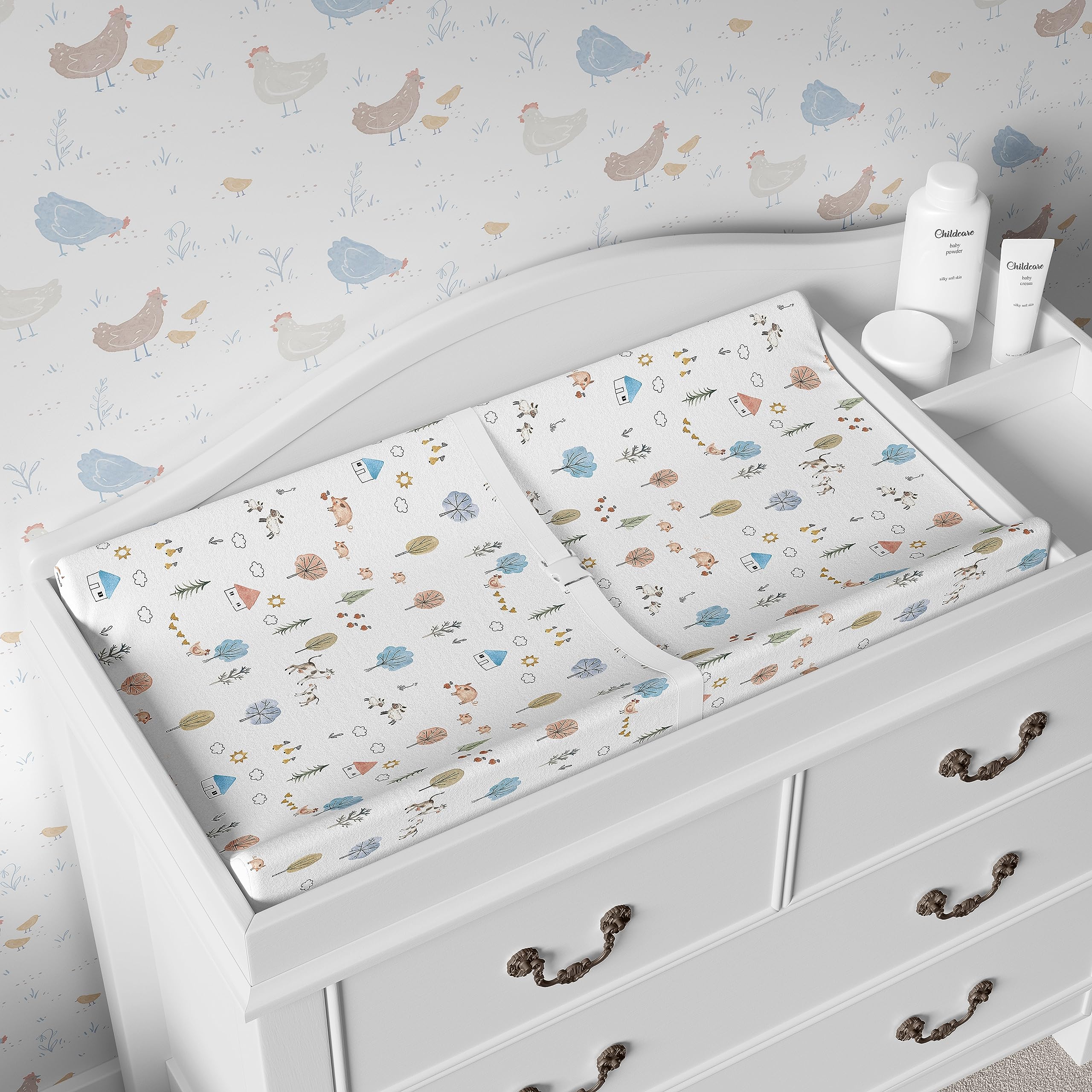 Sorrel + Fern farm animals pattern changing pad cover stays bright after washes.