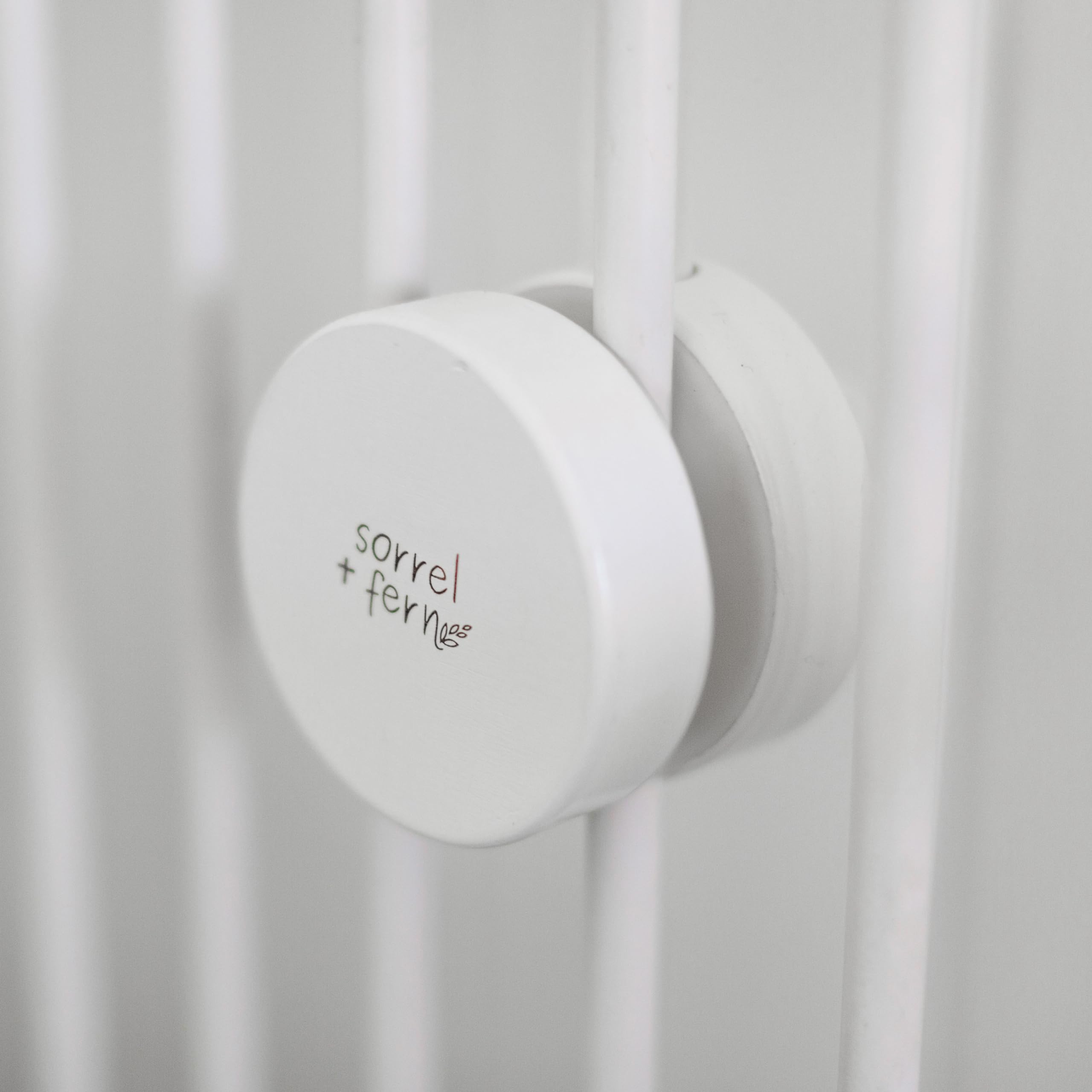 Sorrel and Fern compatible with slatted cribs and flat surfaces for versatile use.