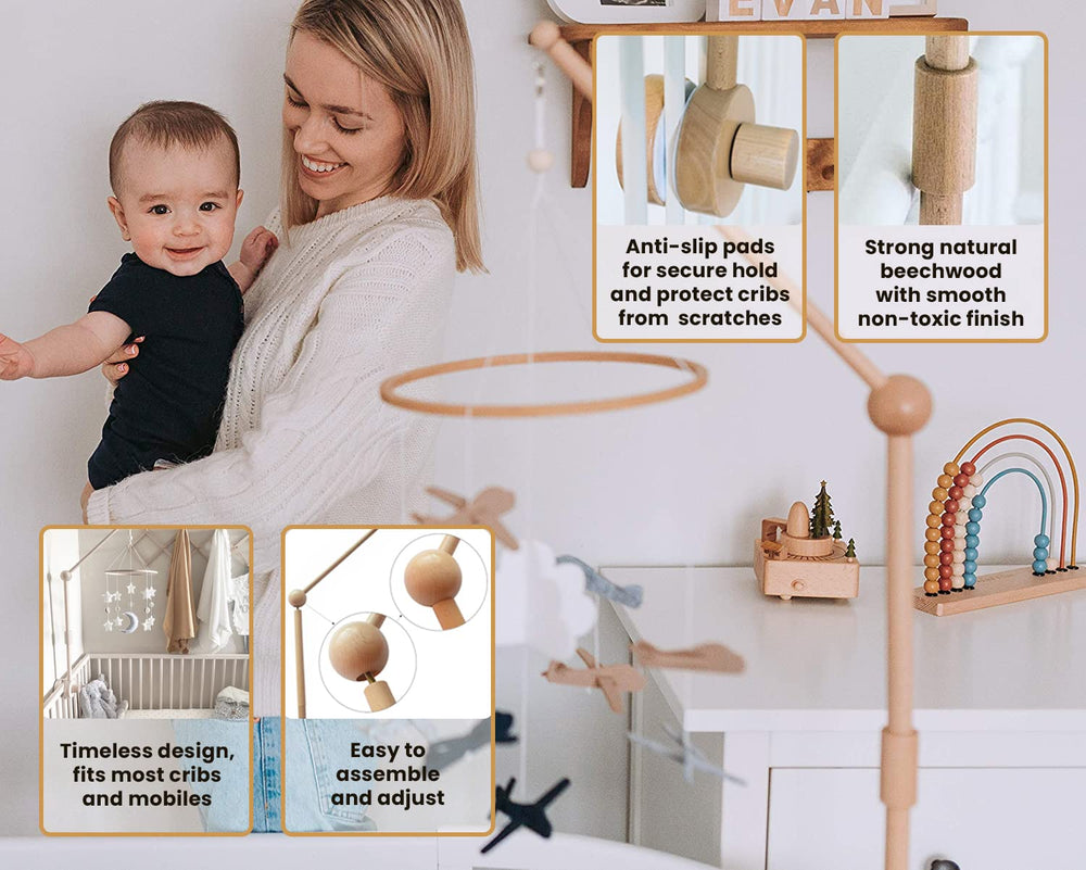 Sorrel + Fern crib mount in natural wood provides sturdy mobile support.