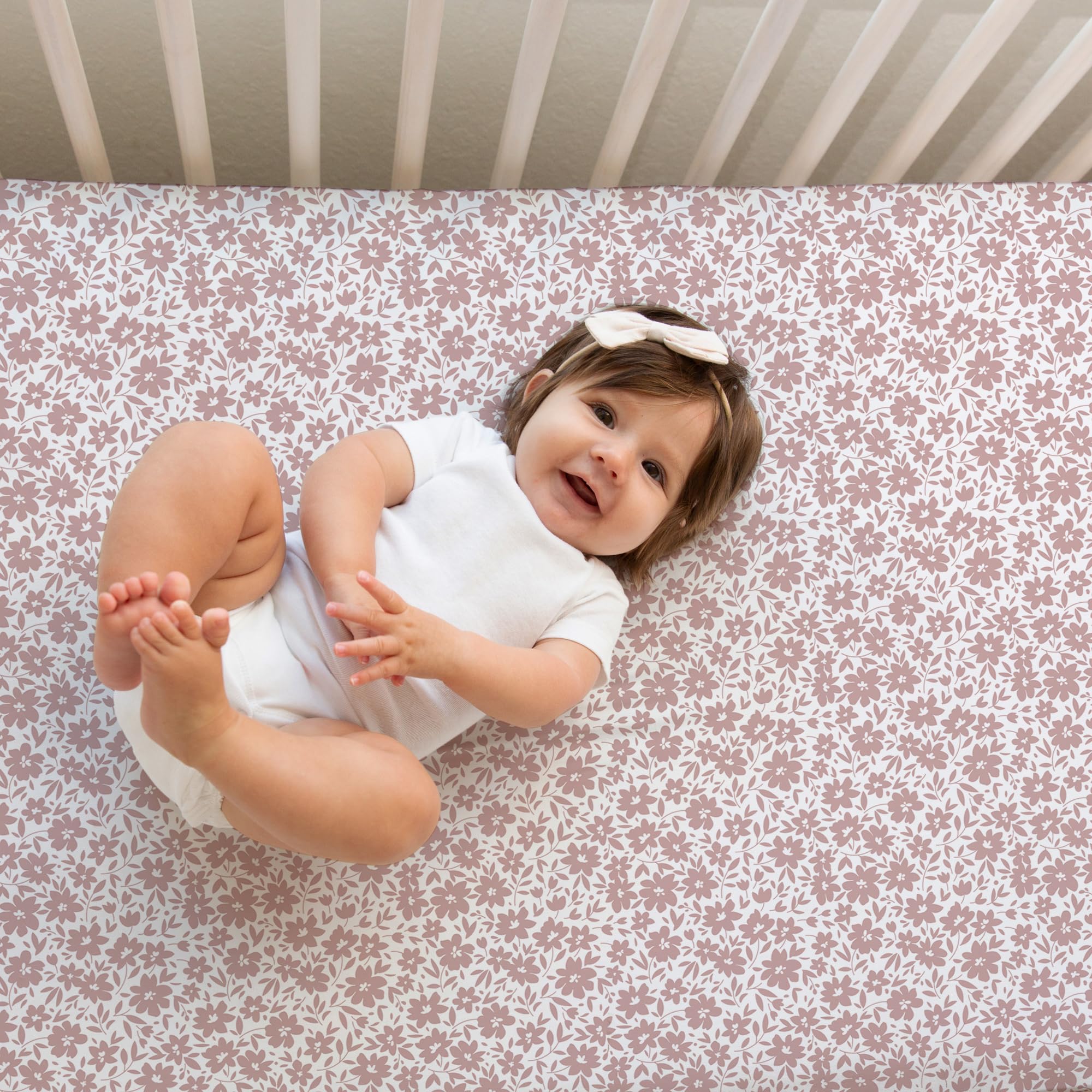 Sorrel + Fern crib sheets Antique Rose folded edges demonstrating durable elastic and snug hug