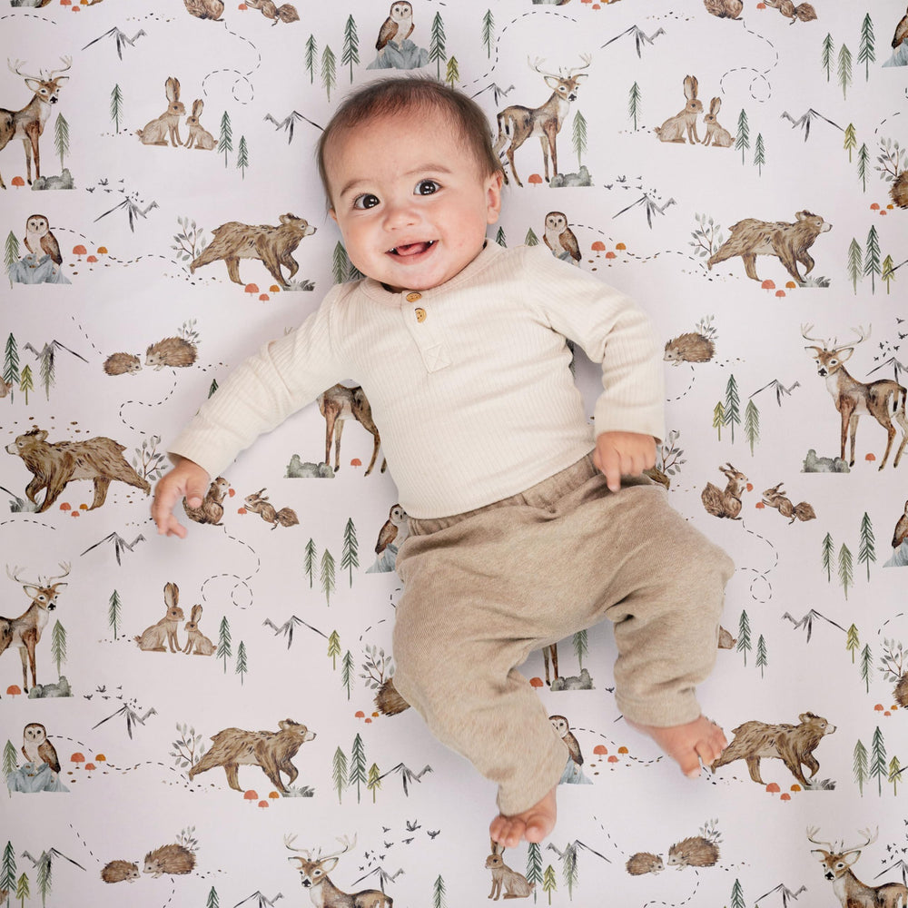 Sorrel + Fern fitted crib sheet with deep pockets for secure fit.