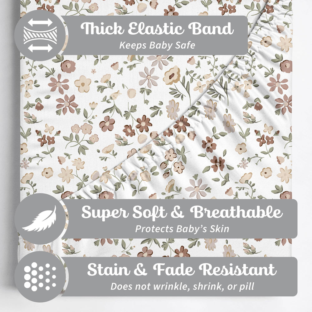 Sorrel + Fern fitted crib sheet showing deep elastic band for secure mattress grip.