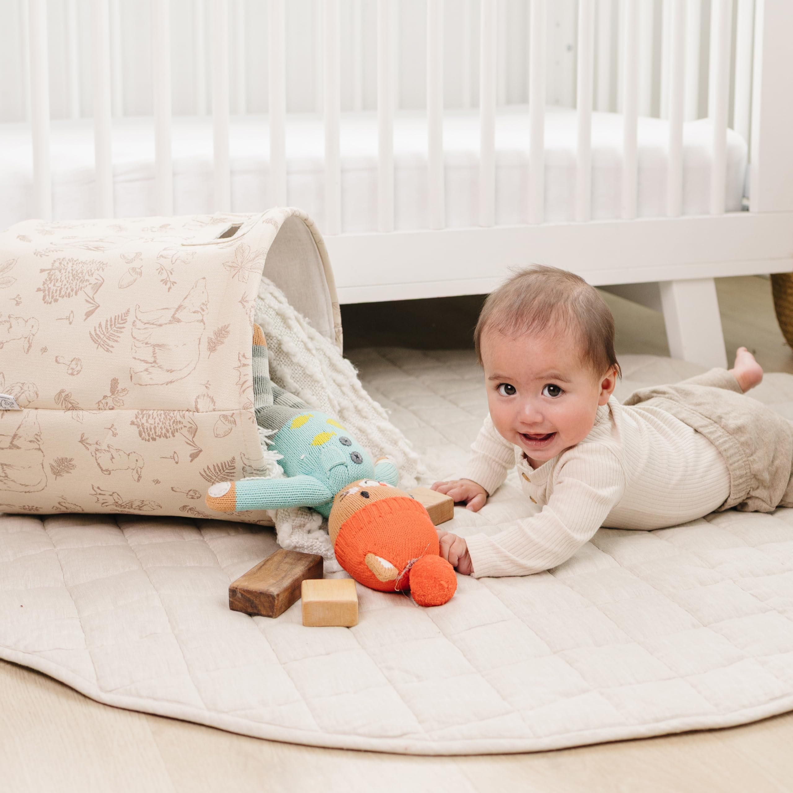 Sorrel + Fern Magic Forest print on nursery organizer brightens playroom vibe.