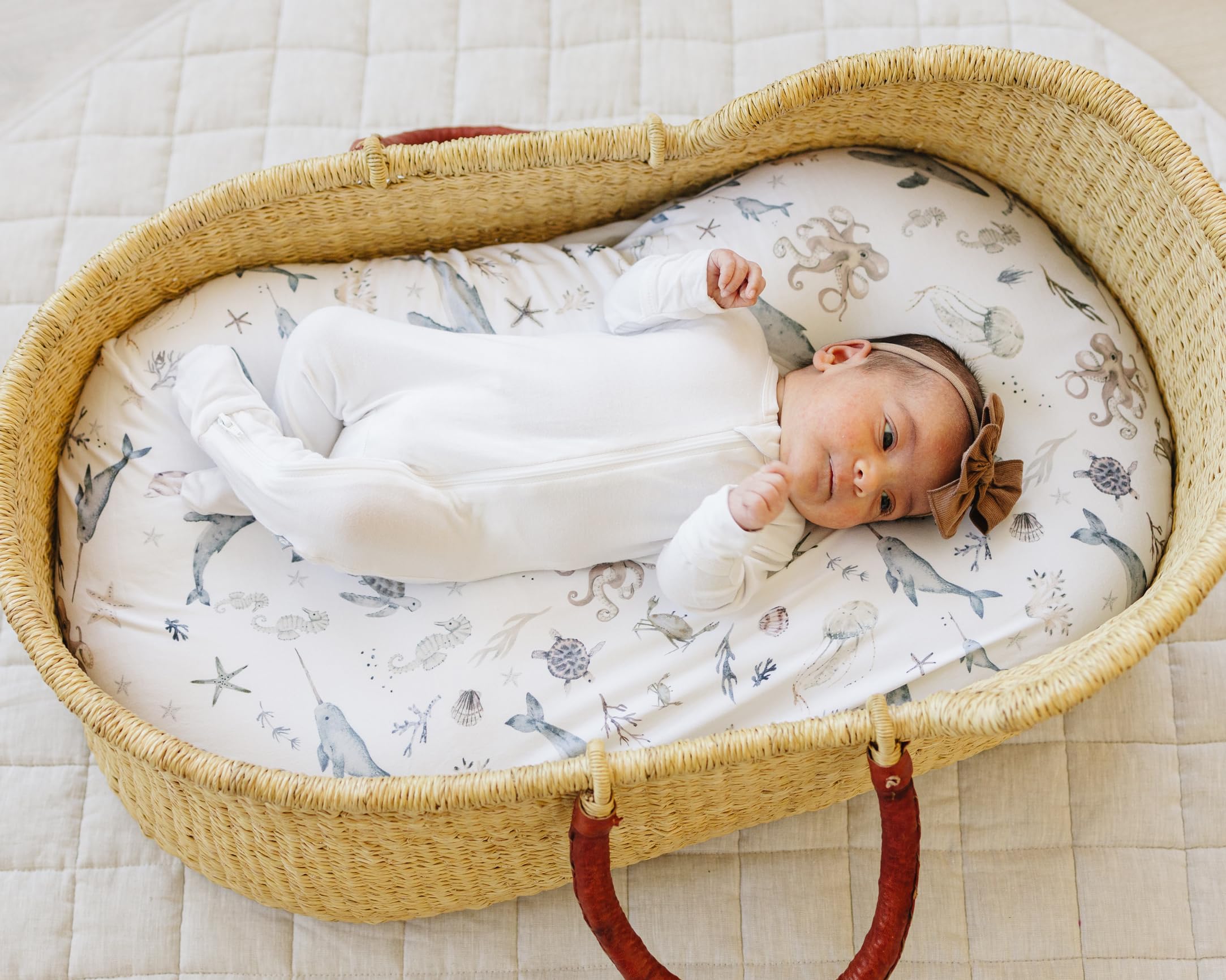 Sorrel + Fern Ocean Odyssey fitted sheet detail highlights secure elastic for snug mattress fit.