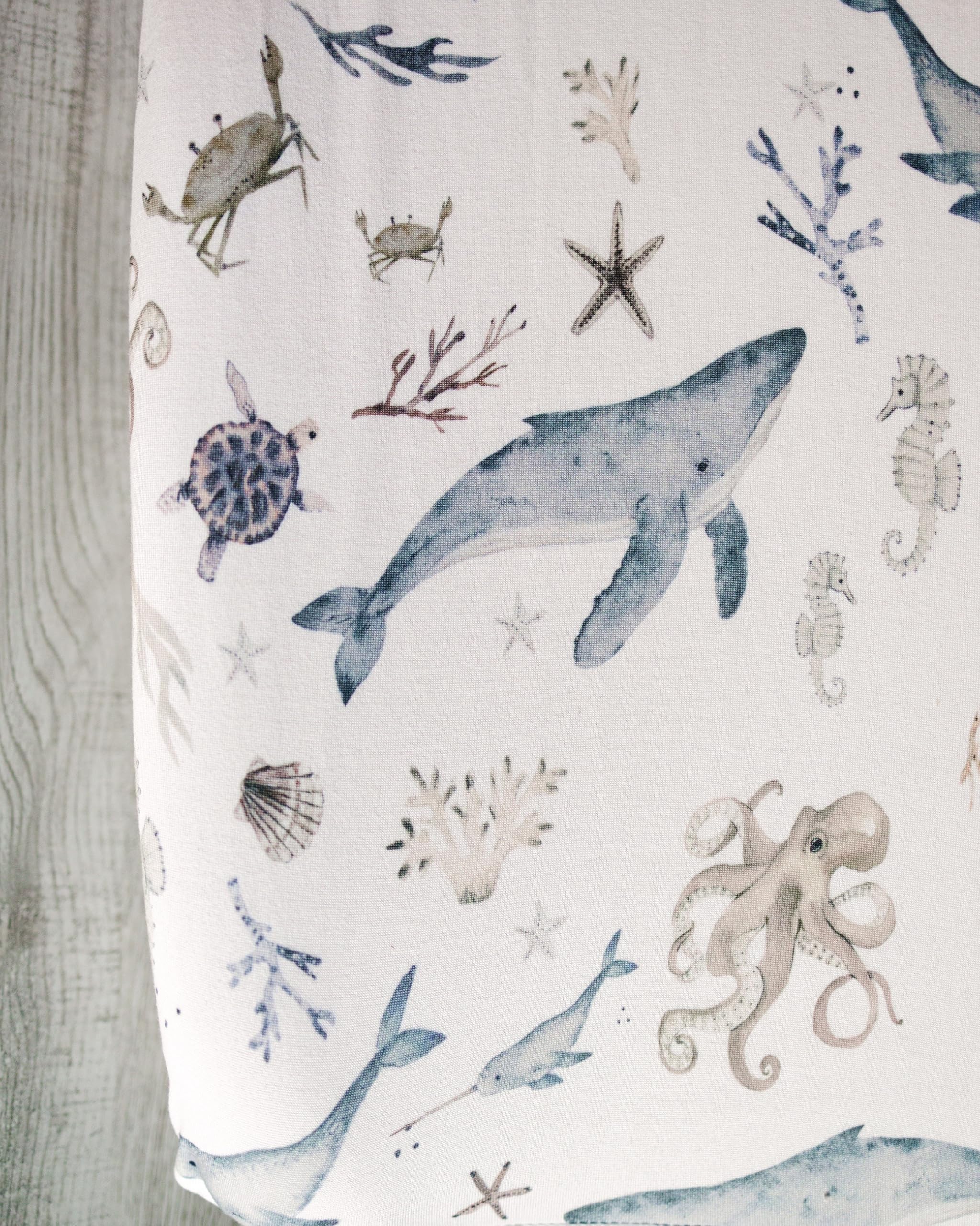 Sorrel + Fern Ocean Odyssey cover with extra-sturdy elastic pockets keeps it securely in place