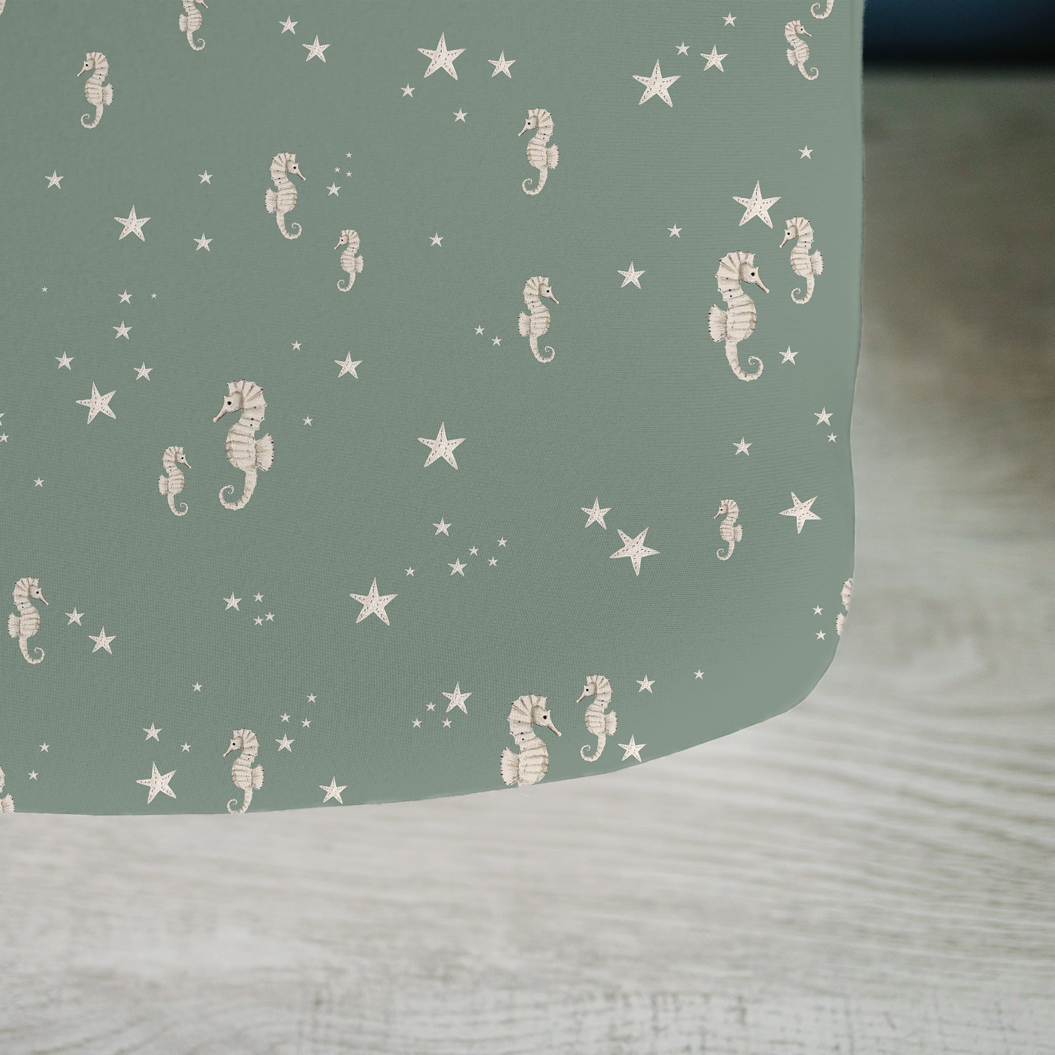 Sorrel + Fern Ocean Odyssey sheet pairs with coordinating nursery decor.