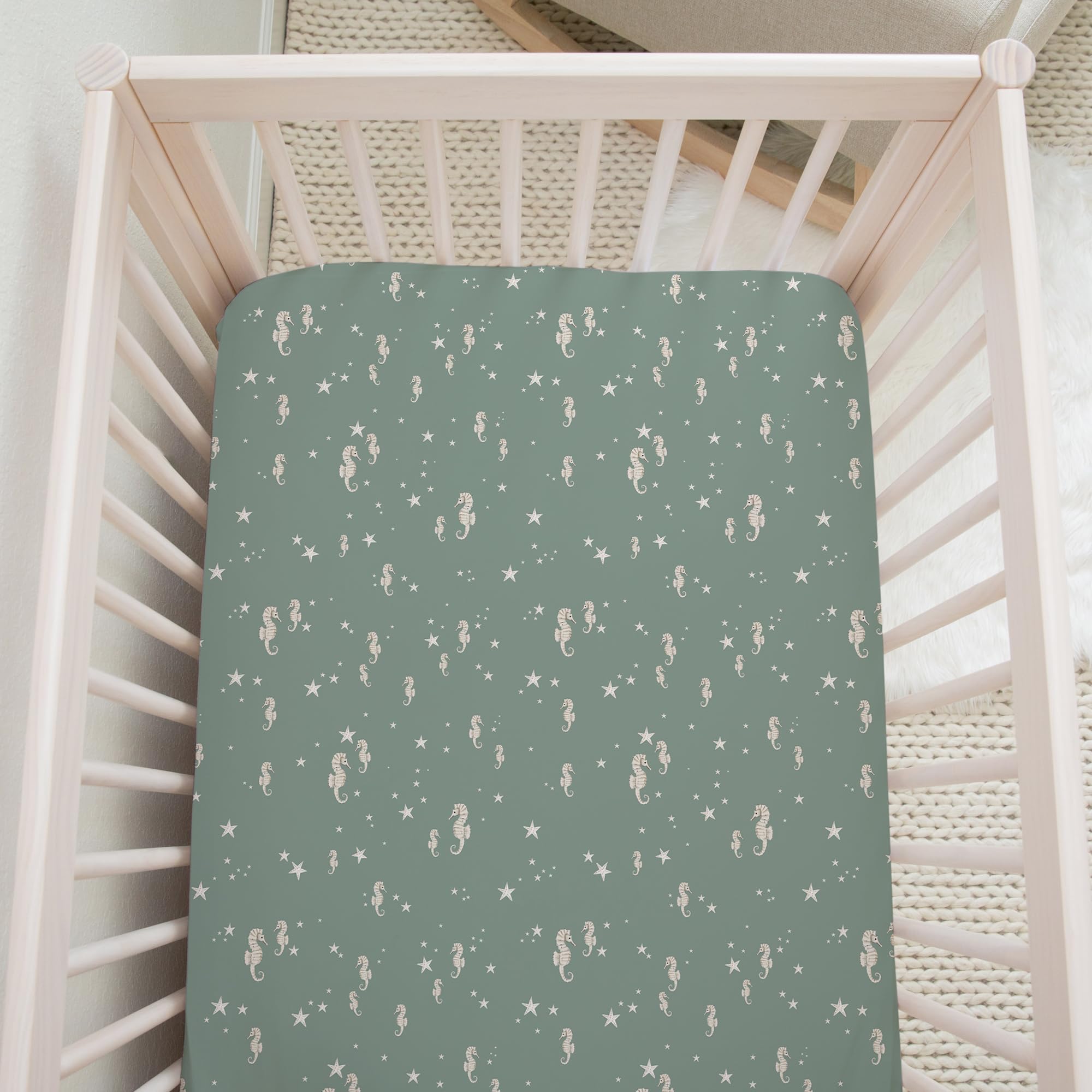 Nursery setup with Sorrel + Fern Ocean Odyssey sheet for a comfy sleep space.