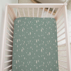 Nursery setup with Sorrel + Fern Ocean Odyssey sheet for a comfy sleep space.