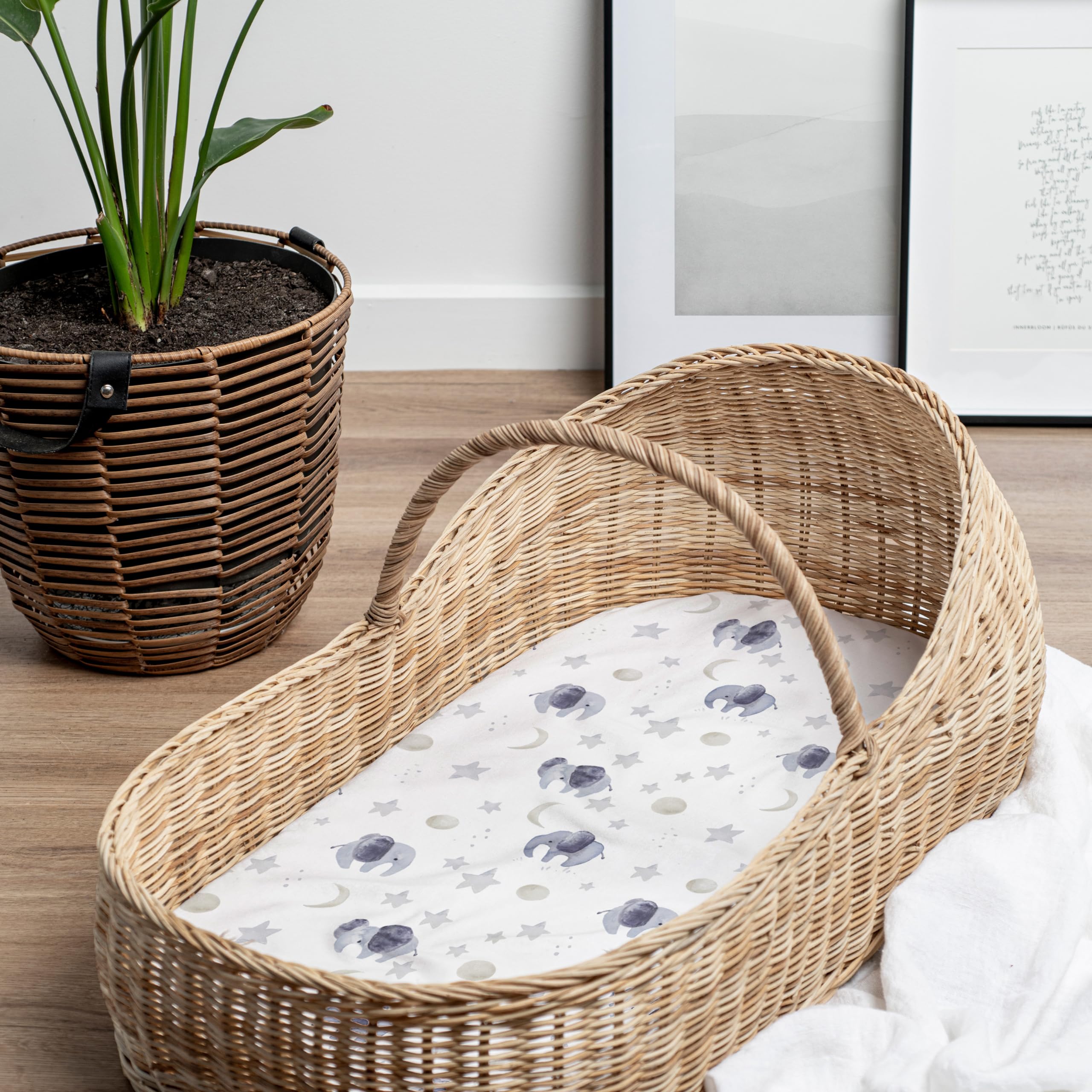 Sorrel + Fern soft cotton blend bassinet sheets with elephants for breathable comfort.