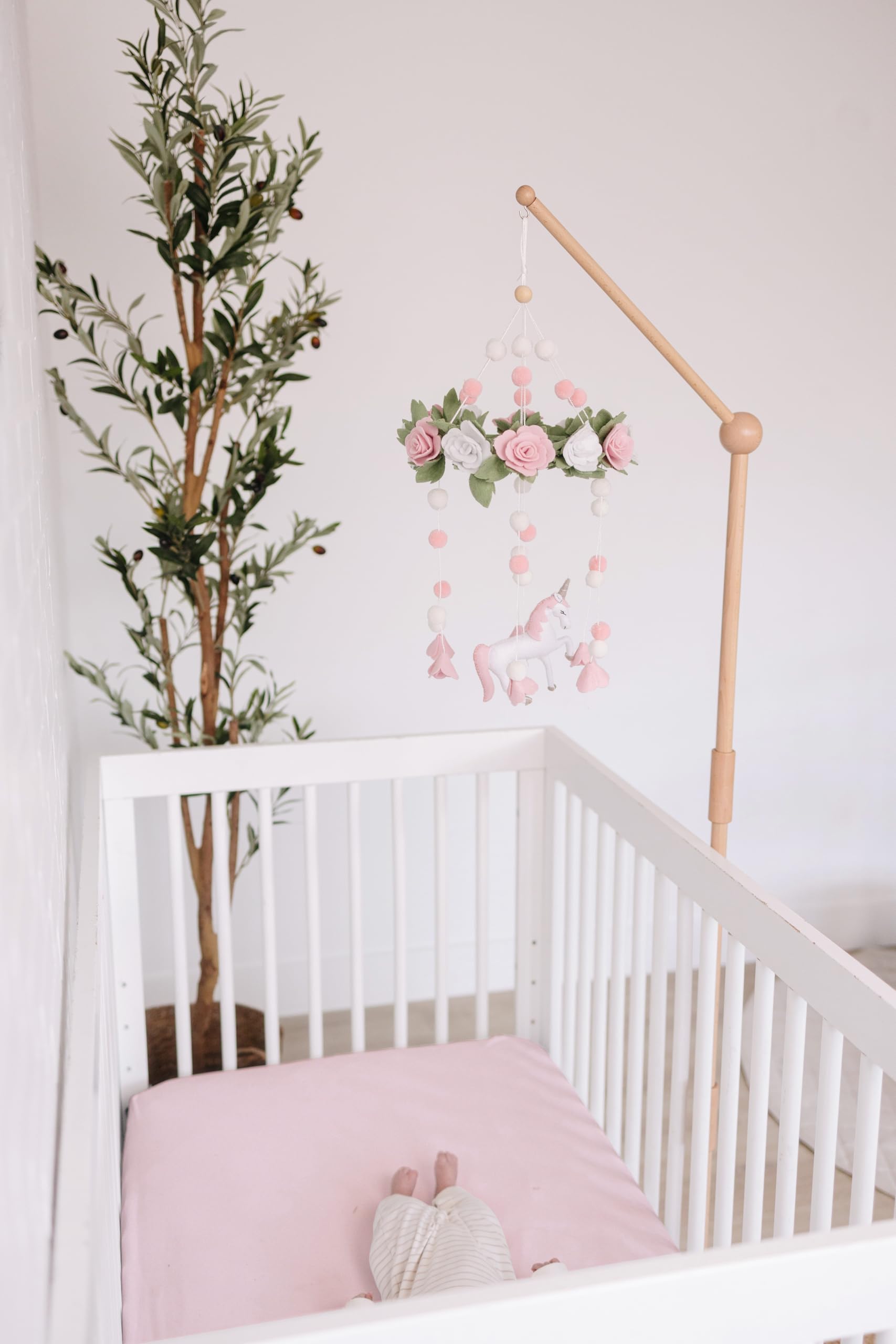 Sorrel + Fern unicorn-blossom-mobile is adjustable to fit crib height.