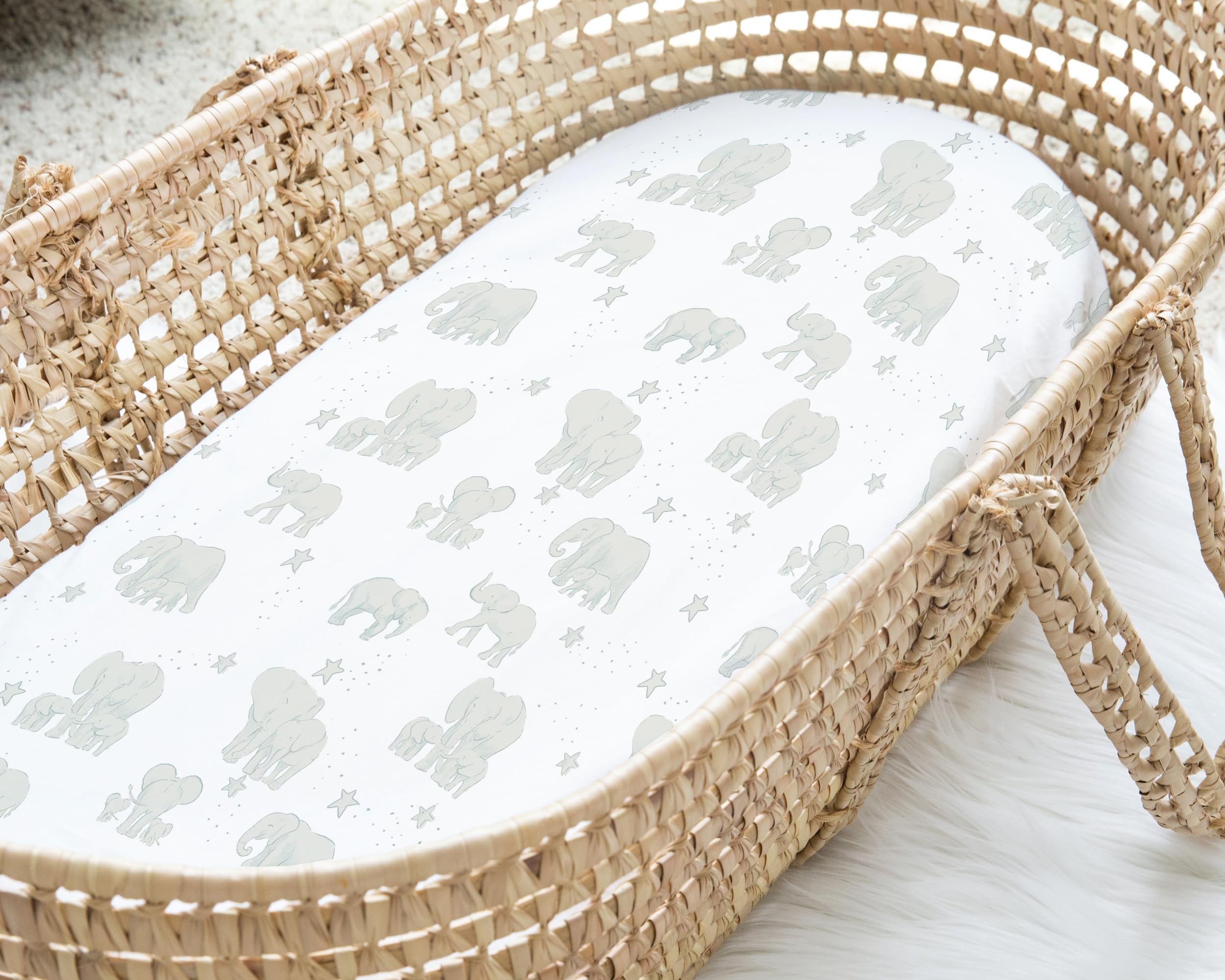 Watercolor elephants pattern from Sorrel + Fern adds charming nursery decor.