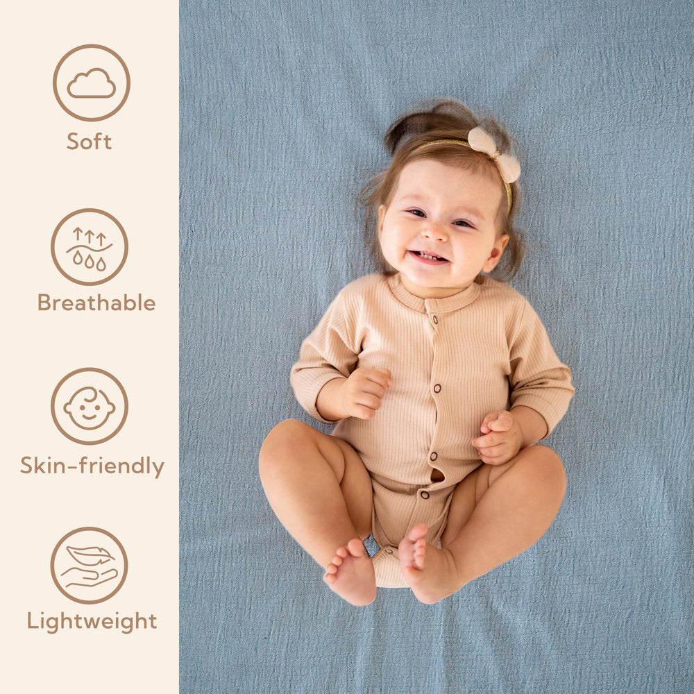 SOULFUL muslin crib sheet elastic band demonstrates secure fit