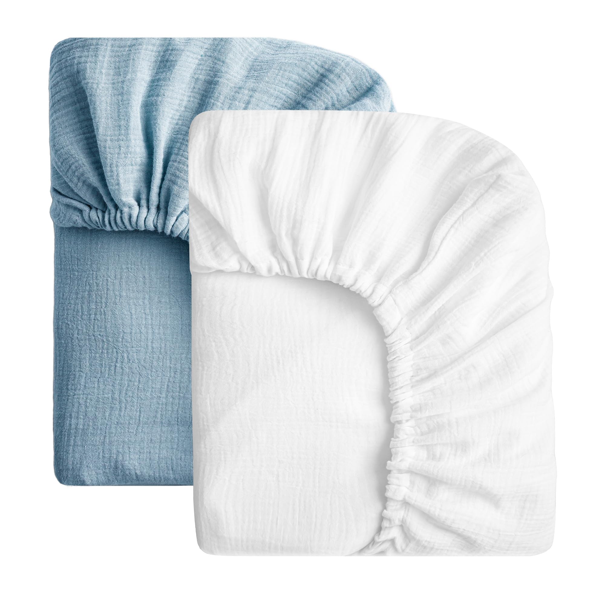 SOULFUL muslin crib sheets in white and blue laid flat for a soft, breathable sleep surface.