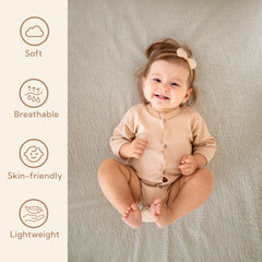 SOULFUL crib sheets elastic band close-up illustrating secure fit