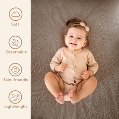 SOULFUL muslin crib sheets elastic edge closeup—snug fit for a secure sleep surface